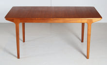 Load image into Gallery viewer, Mid Century extending teak dining table by McIntosh, circa 1960s. 