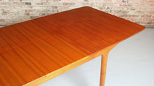 Load image into Gallery viewer, Mid Century extending teak dining table by McIntosh, circa 1960s. 