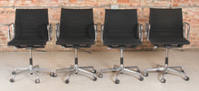 Load image into Gallery viewer, Set of 4 model EA117 Eames swivel office chairs with black fabric upholstery manufactured by Vitra, circa 1980s