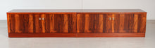 Load image into Gallery viewer, A pair of Mid Century rosewood low sideboards with hinged brass handles by Troeds, Sweden, circa 1970s