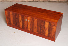 Load image into Gallery viewer, A pair of Mid Century rosewood low sideboards with hinged brass handles by Troeds, Sweden, circa 1970s