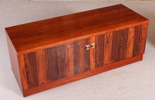 Load image into Gallery viewer, A pair of Mid Century rosewood low sideboards with hinged brass handles by Troeds, Sweden, circa 1970s