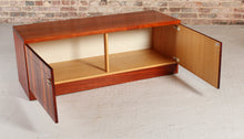 Load image into Gallery viewer, A pair of Mid Century rosewood low sideboards with hinged brass handles by Troeds, Sweden, circa 1970s