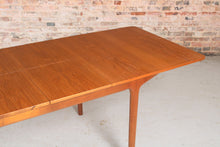 Load image into Gallery viewer, A Midcentury Teak Extending Dining Table and Six Chairs by McIntosh. c1960s