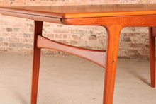 Load image into Gallery viewer, Danish Mid Century extending teak dining table by Arne Hovmand Olsen for Mogens Kold, circa 1960s