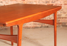 Load image into Gallery viewer, Danish Mid Century extending teak dining table by Arne Hovmand Olsen for Mogens Kold, circa 1960s