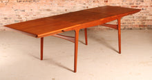 Load image into Gallery viewer, Danish Mid Century extending teak dining table by Arne Hovmand Olsen for Mogens Kold, circa 1960s