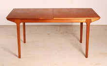 Load image into Gallery viewer, Mid Century extending teak dining table by McIntosh, circa 1960s