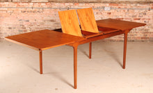 Load image into Gallery viewer, Mid Century extending teak dining table by McIntosh, circa 1960s