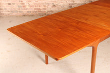 Load image into Gallery viewer, Mid Century extending teak dining table by McIntosh, circa 1960s