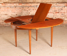 Load image into Gallery viewer, Mid Century extending teak dining table by Greaves&Thomas, circa 1960s.