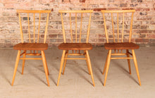 Load image into Gallery viewer, A set of 3 Ercol model 391 elm and beech chairs circa 1960s