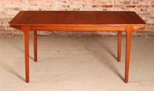 Load image into Gallery viewer, Mid Century extending teak dining table by Mcintosh, circa 1960s.