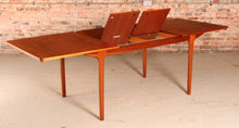 Load image into Gallery viewer, Mid Century extending teak dining table by Mcintosh, circa 1960s.