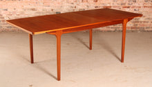 Load image into Gallery viewer, Mid Century extending teak dining table by Mcintosh, circa 1960s.