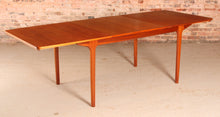 Load image into Gallery viewer, Mid Century extending teak dining table by Mcintosh, circa 1960s.