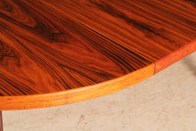 Load image into Gallery viewer, Danish Mid Century extending round/oval rosewood dining table, circa 1970s