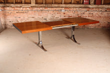 Load image into Gallery viewer, Danish Mid Century extending teak dining table with chrome legs by Poul Norrelikt for Dyrlund, circa 1970s
