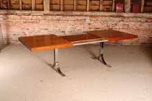 Load image into Gallery viewer, Danish Mid Century extending teak dining table with chrome legs by Poul Norrelikt for Dyrlund, circa 1970s