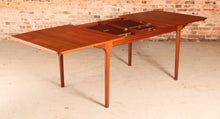 Load image into Gallery viewer, Mid Century extending teak dining table by McIntosh, circa 1960s