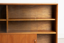 Load image into Gallery viewer, Midcentury Slim Teak Bookcase with Sliding Doors by Herbert E Gibbs c.1965