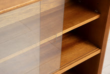Load image into Gallery viewer, Midcentury Slim Teak Bookcase with Sliding Doors by Herbert E Gibbs c.1965