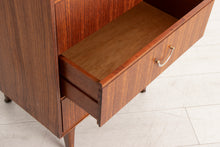 Load image into Gallery viewer, Midcentury Tallboy/Chest of Drawers in Tola with Brass Handles by Meredew c.1960