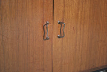 Load image into Gallery viewer, British Mid Century Nathan drinks cabinet in tola and black, circa 1950s.