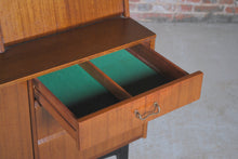 Load image into Gallery viewer, British Mid Century Nathan drinks cabinet in tola and black, circa 1950s.