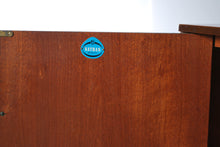 Load image into Gallery viewer, British Mid Century Nathan drinks cabinet in tola and black, circa 1950s.
