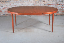 Load image into Gallery viewer, Danish Mid Century teak extending oval/round dining table by Kai Kristiansen, circa 1960s