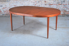 Load image into Gallery viewer, Danish Mid Century teak extending oval/round dining table by Kai Kristiansen, circa 1960s