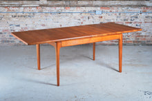 Load image into Gallery viewer, Danish Mid Century solid teak exteding dining table by Glostrup Mobelfabrik, circa 1970s.