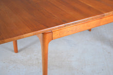 Load image into Gallery viewer, Danish Mid Century solid teak exteding dining table by Glostrup Mobelfabrik, circa 1970s.