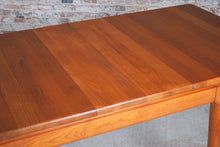 Load image into Gallery viewer, Danish Mid Century solid teak exteding dining table by Glostrup Mobelfabrik, circa 1970s.