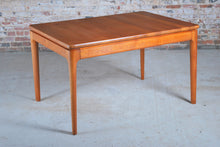 Load image into Gallery viewer, Danish Mid Century solid teak exteding dining table by Glostrup Mobelfabrik, circa 1970s.