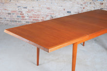 Load image into Gallery viewer, Danish Mid Century extending teak dining table by Fritz Hansen, circa 1960s