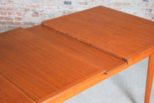 Load image into Gallery viewer, Danish Mid Century extending teak dining table by Fritz Hansen, circa 1960s