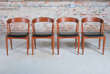 Load image into Gallery viewer, Set of 4 Danish Mid Century Model 16 teak dining chairs with original black vinyl upholstery by Johannes Andersen for Uldum Mobelfabrik, circa 1960s.