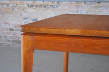 Load image into Gallery viewer, Danish Mid Century solid teak exteding dining table by Glostrup Mobelfabrik, circa 1970s.