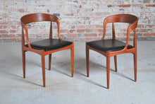 Load image into Gallery viewer, Set of 4 Danish Mid Century Model 16 teak dining chairs with original black vinyl upholstery by Johannes Andersen for Uldum Mobelfabrik, circa 1960s.