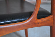 Load image into Gallery viewer, Set of 4 Danish Mid Century Model 16 teak dining chairs with original black vinyl upholstery by Johannes Andersen for Uldum Mobelfabrik, circa 1960s.