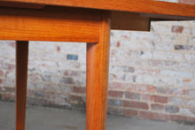 Load image into Gallery viewer, Danish Mid Century extending teak dining table by Fritz Hansen, circa 1960s