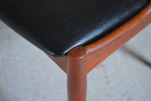 Load image into Gallery viewer, Set of 4 Danish Mid Century Model 16 teak dining chairs with original black vinyl upholstery by Johannes Andersen for Uldum Mobelfabrik, circa 1960s.