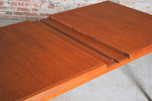 Load image into Gallery viewer, Danish Mid Century extending teak dining table by Fritz Hansen, circa 1960s