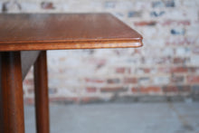 Load image into Gallery viewer, Mid Century extending teak dining table and 6 chairs, circa 1960s.