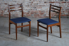 Load image into Gallery viewer, Mid Century extending teak dining table and 6 chairs, circa 1960s.