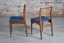 Load image into Gallery viewer, Mid Century extending teak dining table and 6 chairs, circa 1960s.