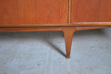 Load image into Gallery viewer, A Mid Century Dunvegan teak sideboard designed by Tom Robertson and manufactured by A.H. McIntosh of Kirkcaldy, Scotland, circa 1960s.