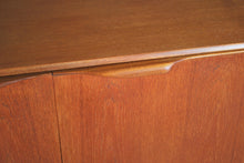 Load image into Gallery viewer, A Mid Century Dunvegan teak sideboard designed by Tom Robertson and manufactured by A.H. McIntosh of Kirkcaldy, Scotland, circa 1960s.